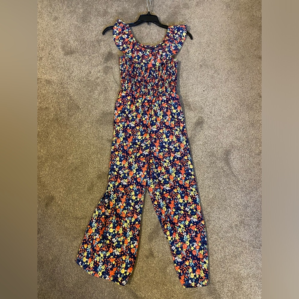 floral kids romper in a size large, only worn twice